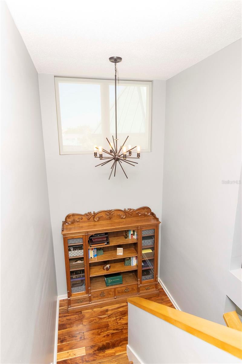 Head upstairs to the second level of this home