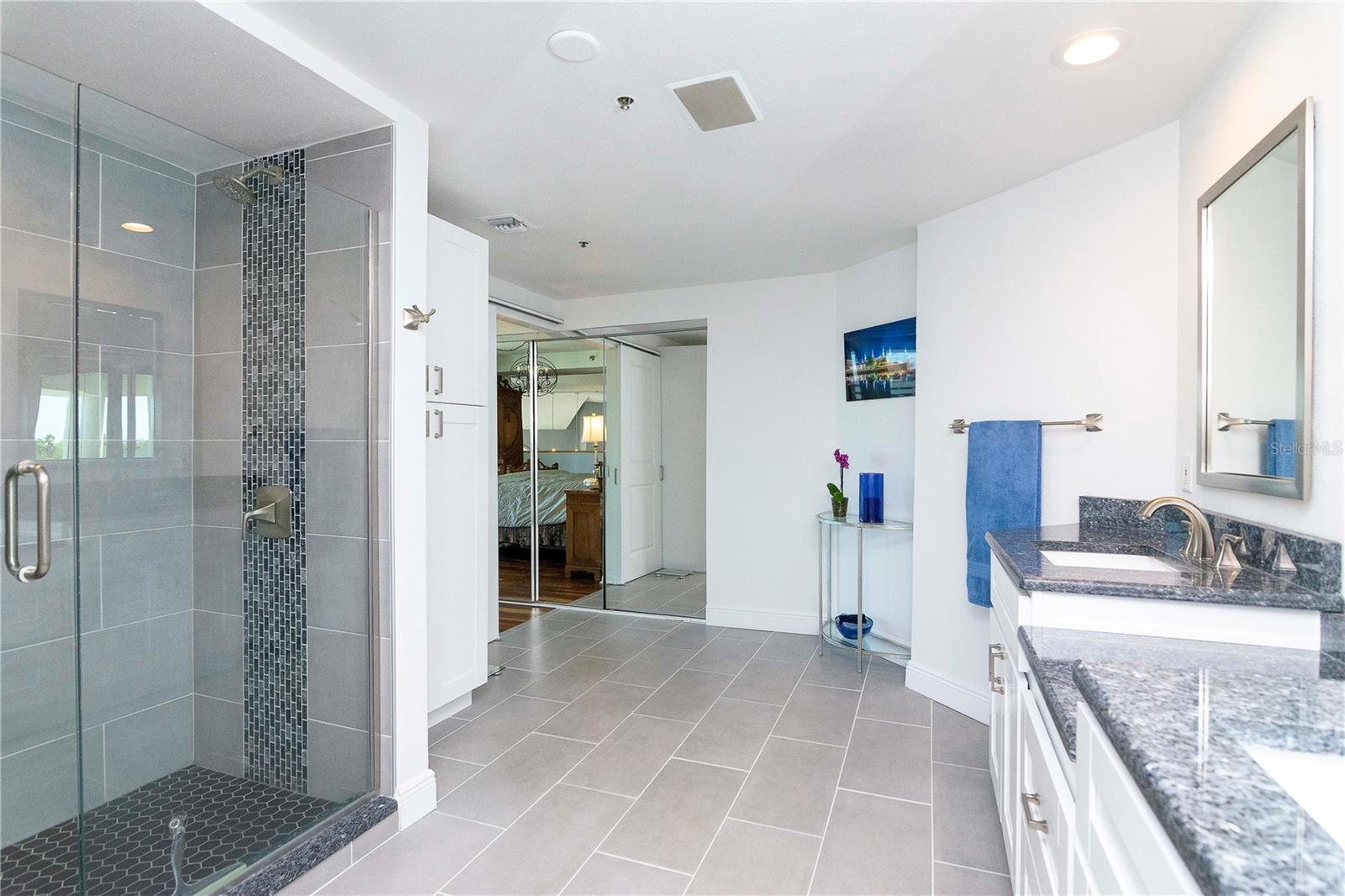His and Hers sinks with a large walk in shower