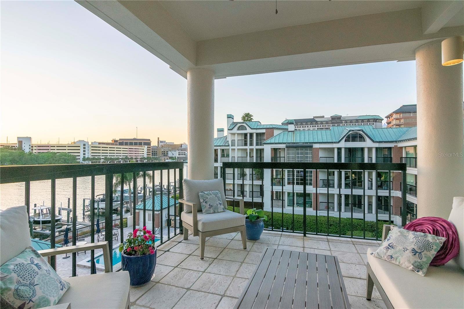 Breathtaking sunset + water views from the wrap around balcony.