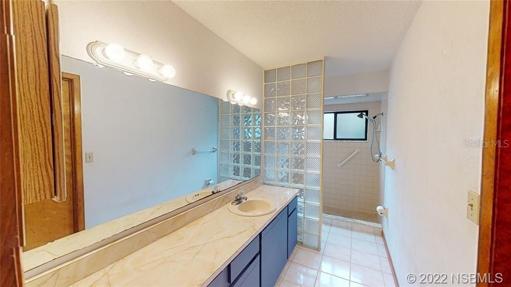 Downstairs bathroom with walk in shower