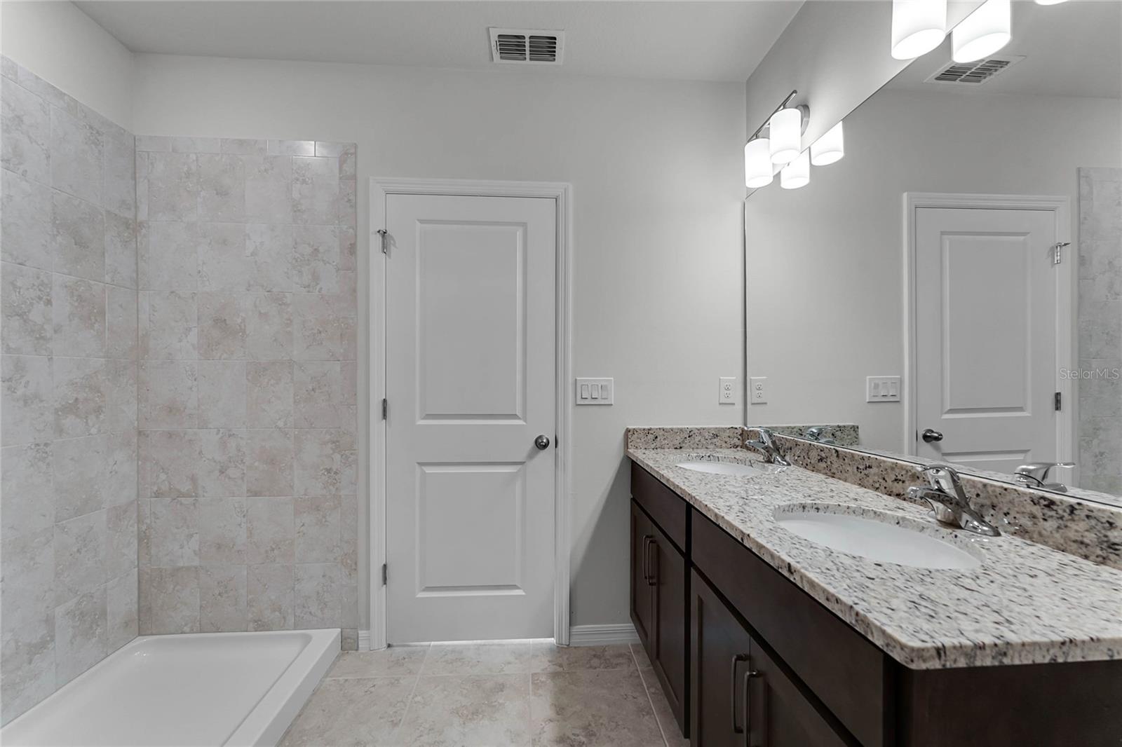 Photos of similar house plan. Colors and specs may vary.