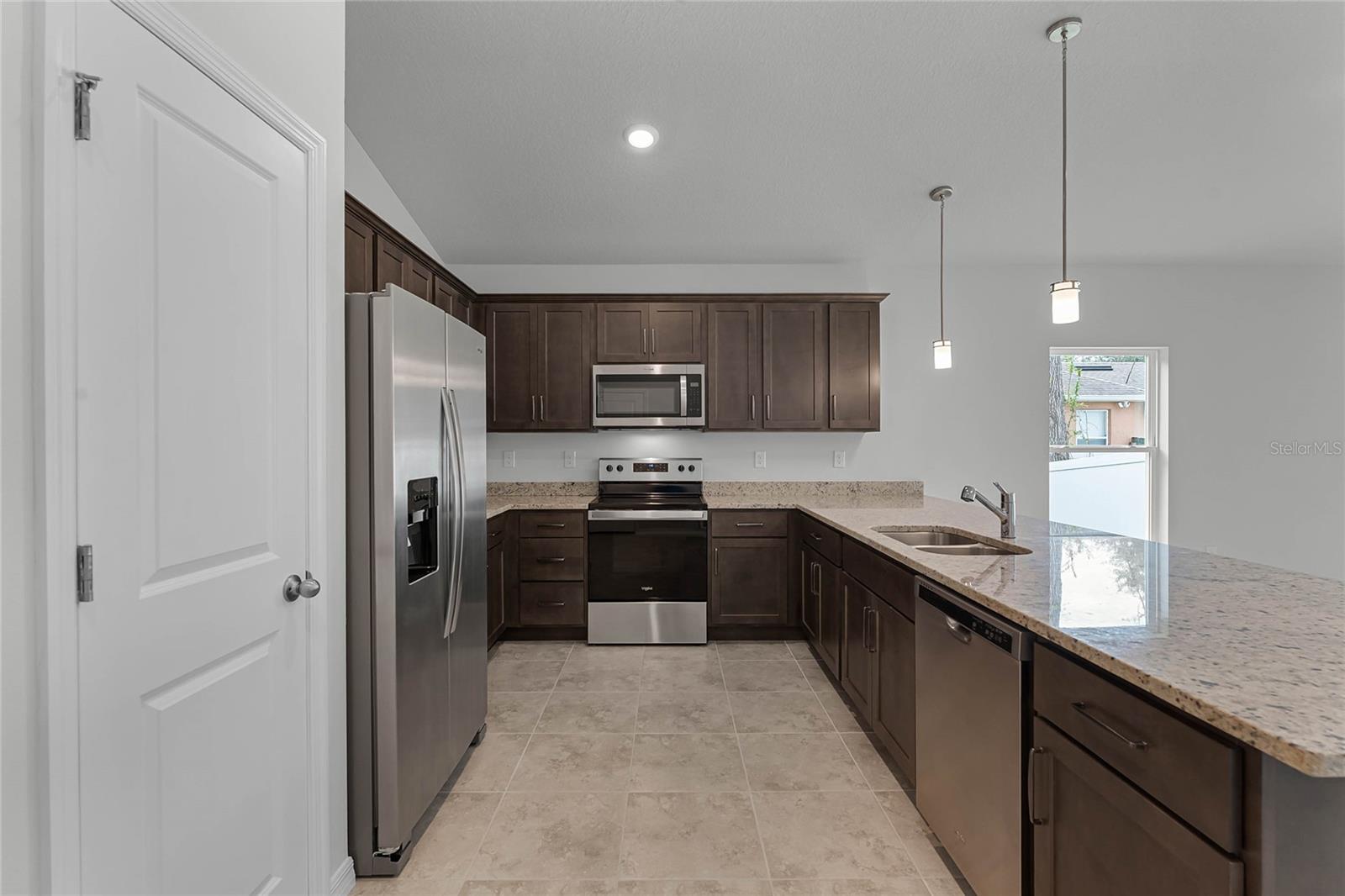 Photos of similar house plan. Colors and specs may vary.
