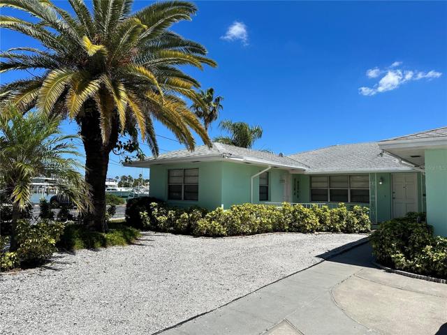 Exterior - facing palm tree