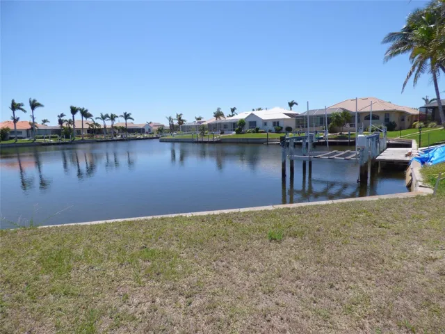 Photo taken from center front of the waterfront. Lot dimensions are 105x120x70x126