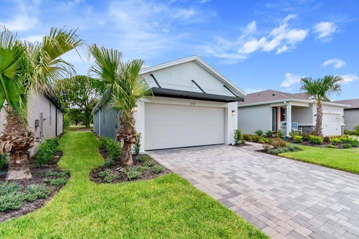 Front of Home With Paver Drive