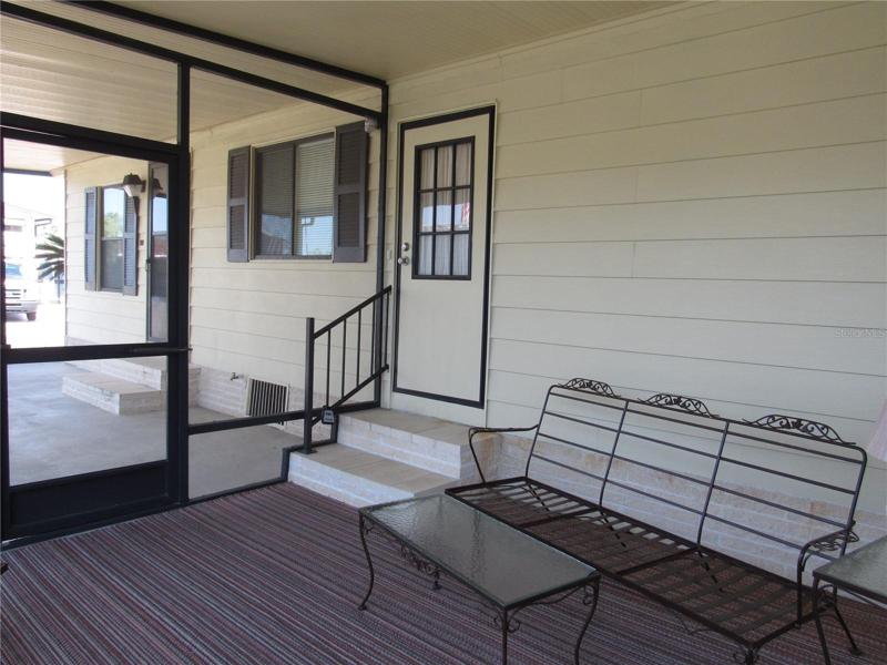 Screen room & Kitchen entry. 