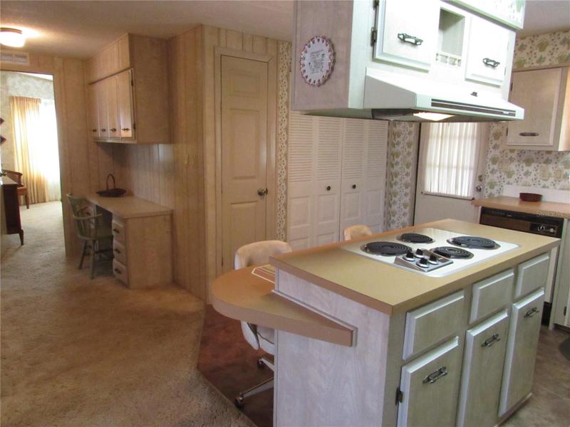Island with cooktop.