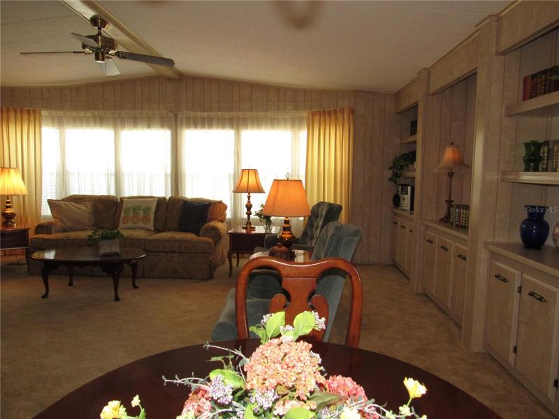 Combined dining area & Living room with full length built-in.