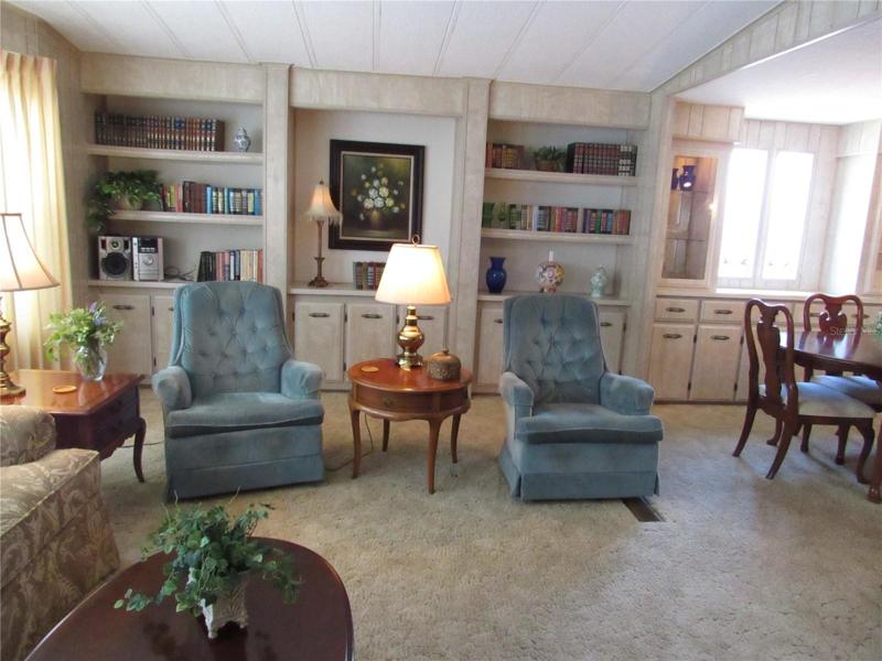 Living room with full length built-in.