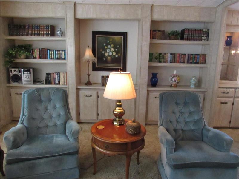 Living room with full length built-in.