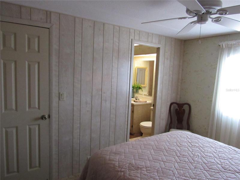 Guest Bedroom with Jack & Jill style Bathroom & walk-in closet.