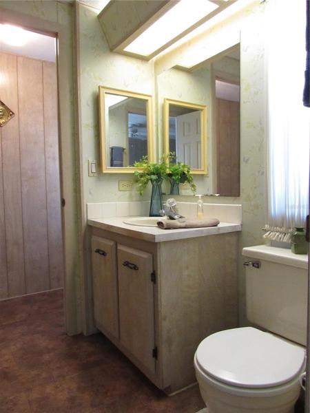 Jack & Jill style Bathroom with access from guest Bedroom and hallway.