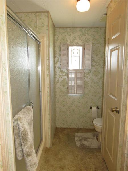 Walk-in shower and linen closet