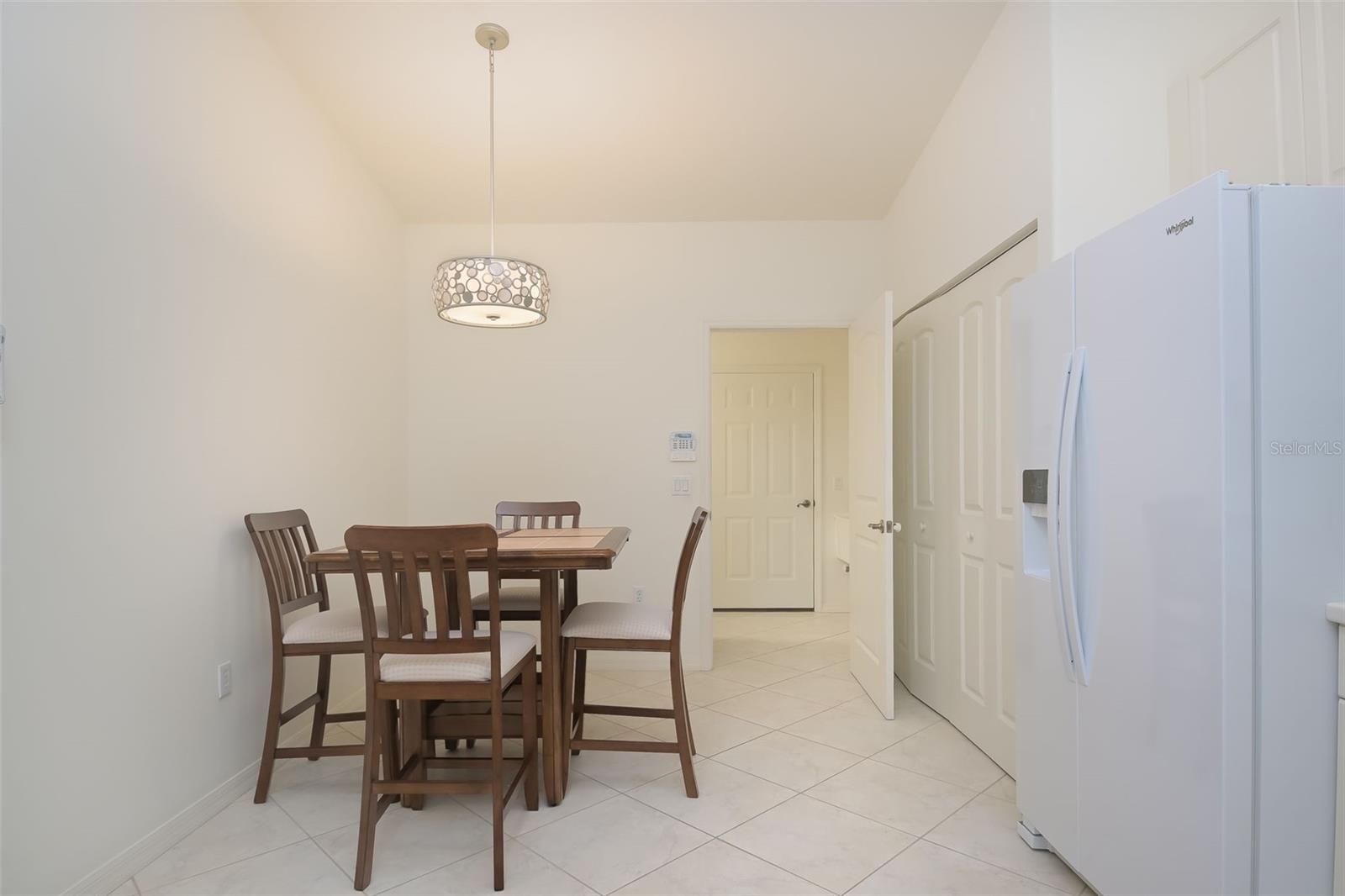 Kitchen  and into the utility room and garage door
