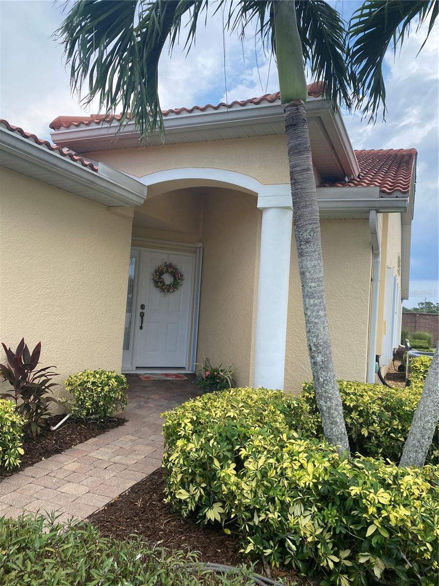 Paved entrance and Front door