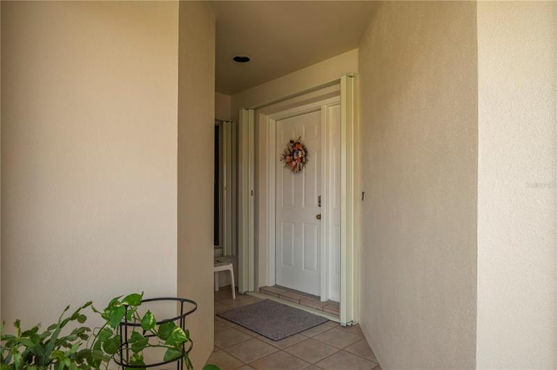 Entry has numeric keypad, breezeway to garage