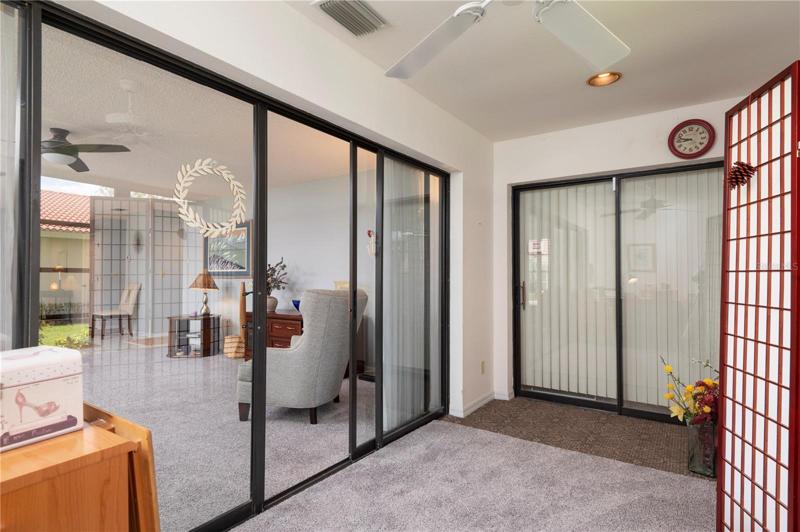 Florida room toward Master with sliders