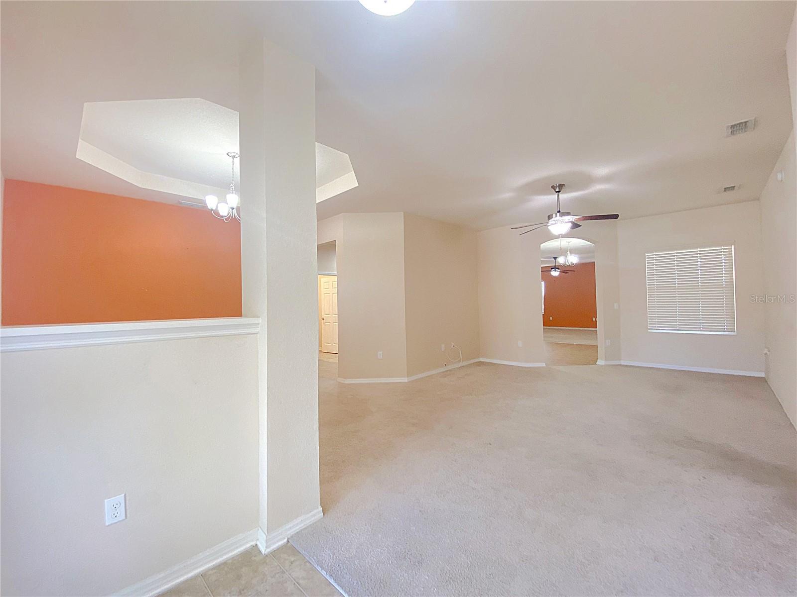 Open foyer leading to the formal living and dining rooms