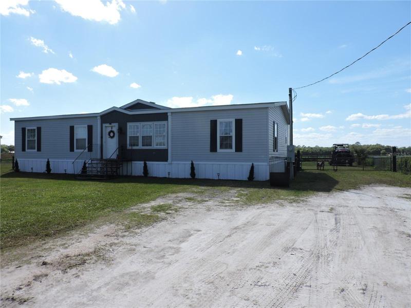 front-w/ room for  parking 3 cars across