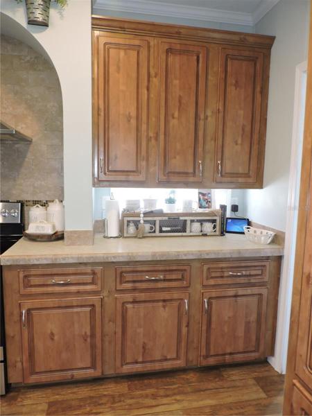 Kitchen counter & cabinets right of range