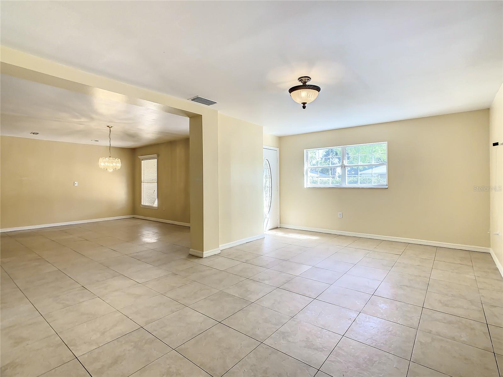 Another Family Room pic leading into the Dining Room/Kitchen