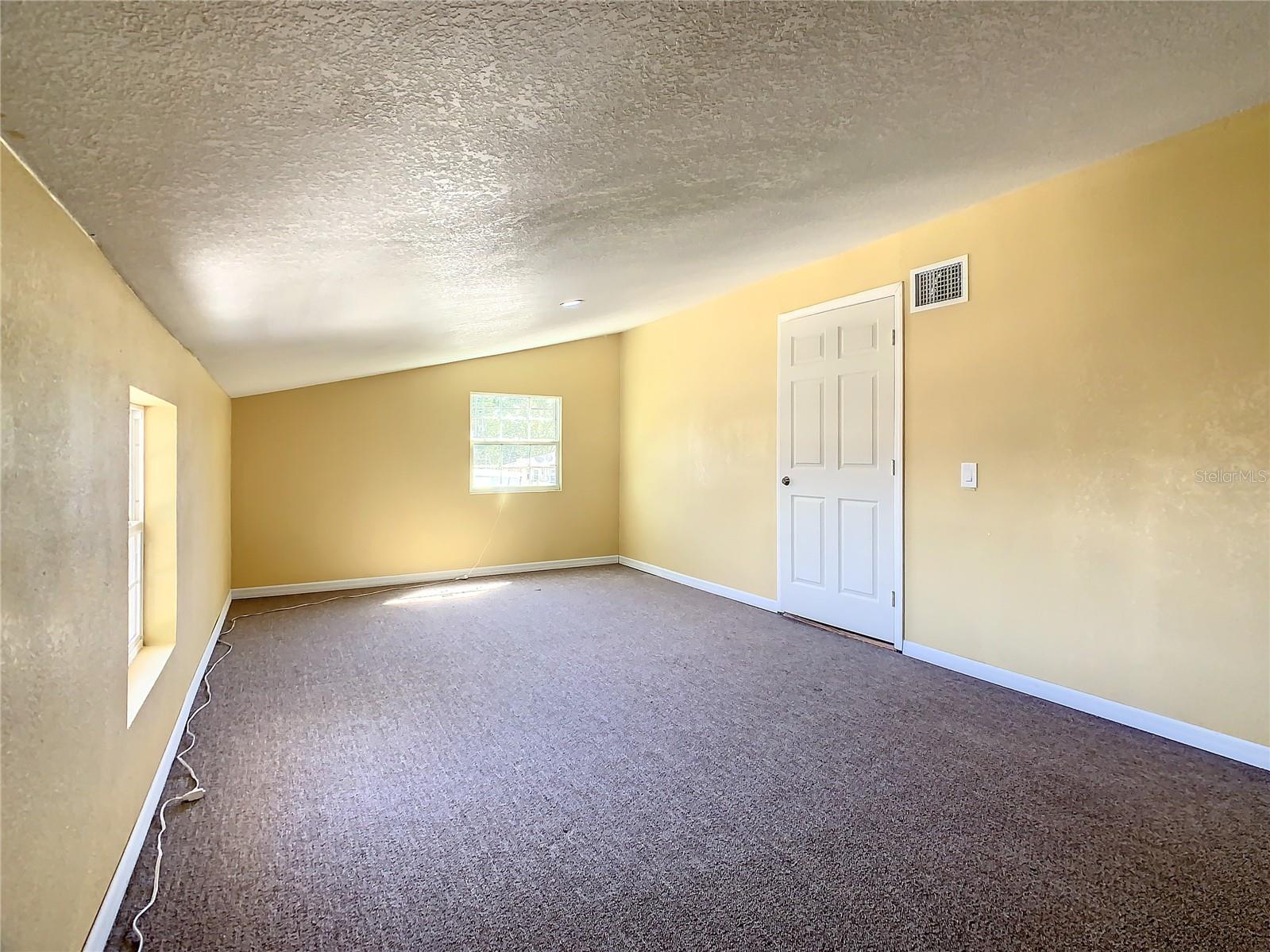 Upstairs Bonus Room with Attic access/storage