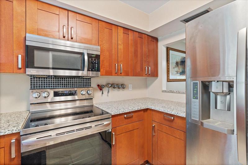 LG appliances | soft close wooden cabinets | window faces East