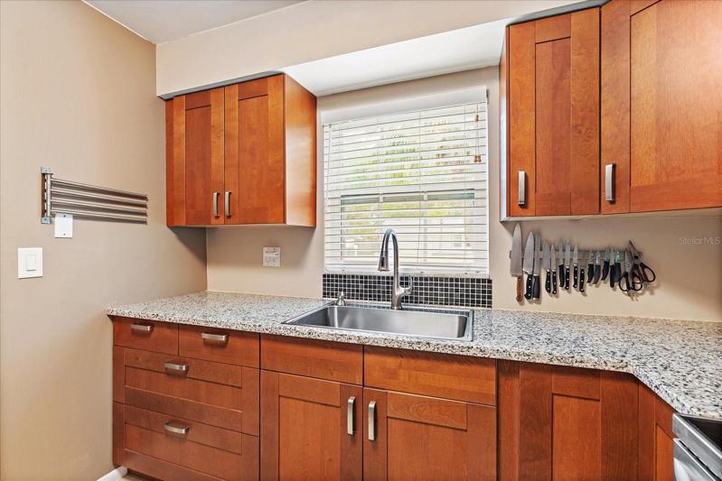 LG appliances | soft close wooden cabinets | window faces East
