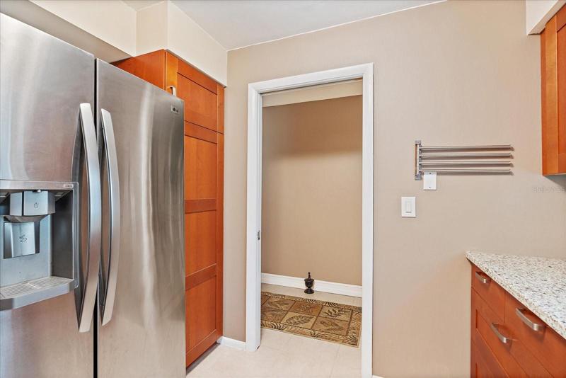 LG appliances | soft close wooden cabinets | granite counters | window faces East