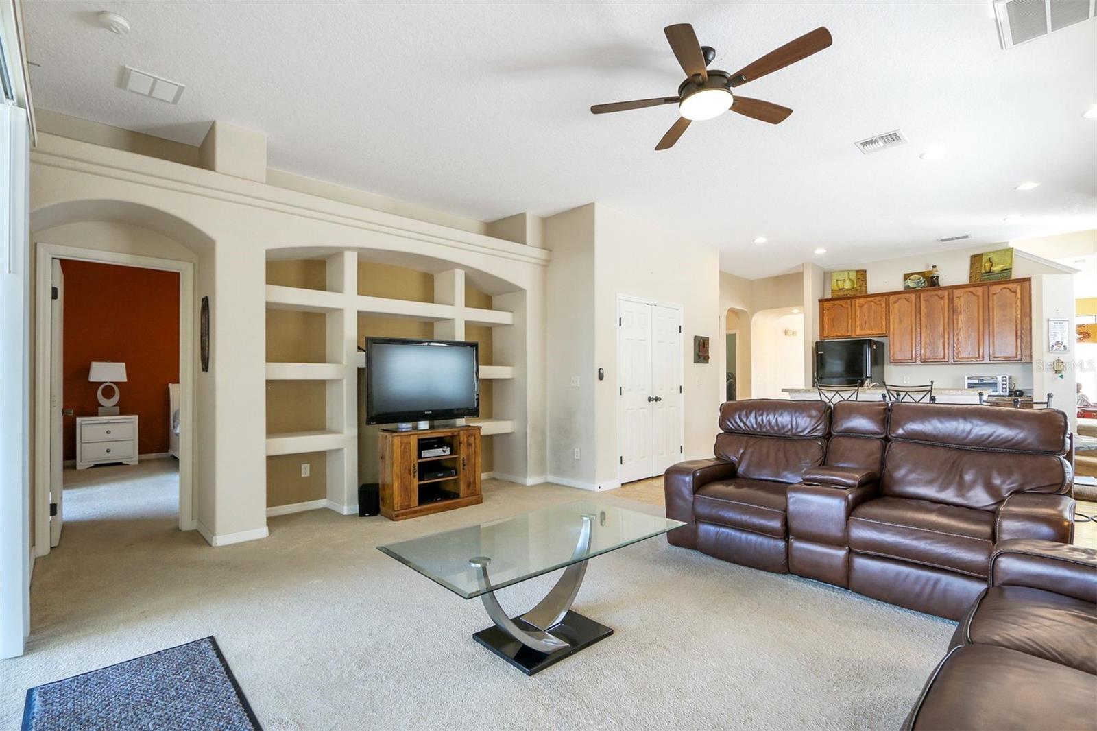 LIVINR ROOM WITH TV SPOT AND SHELVING