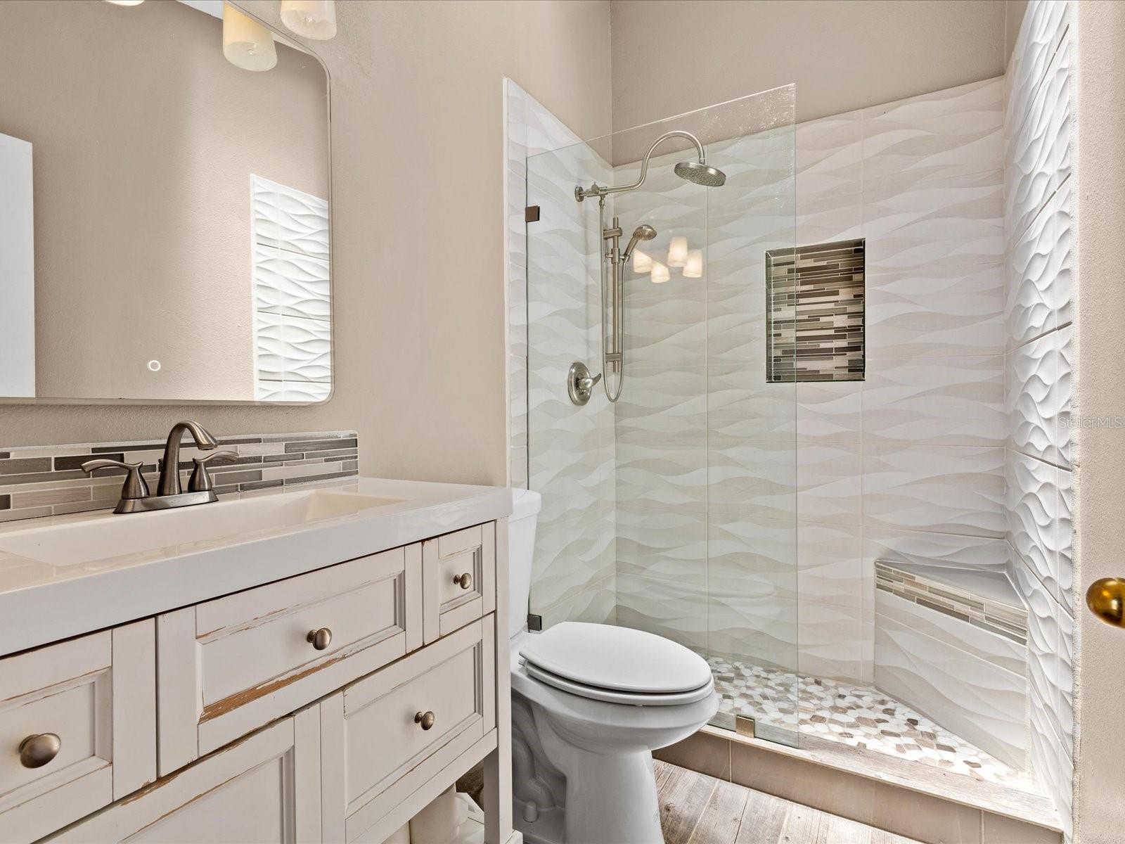 Main bathroom. Walk in shower.