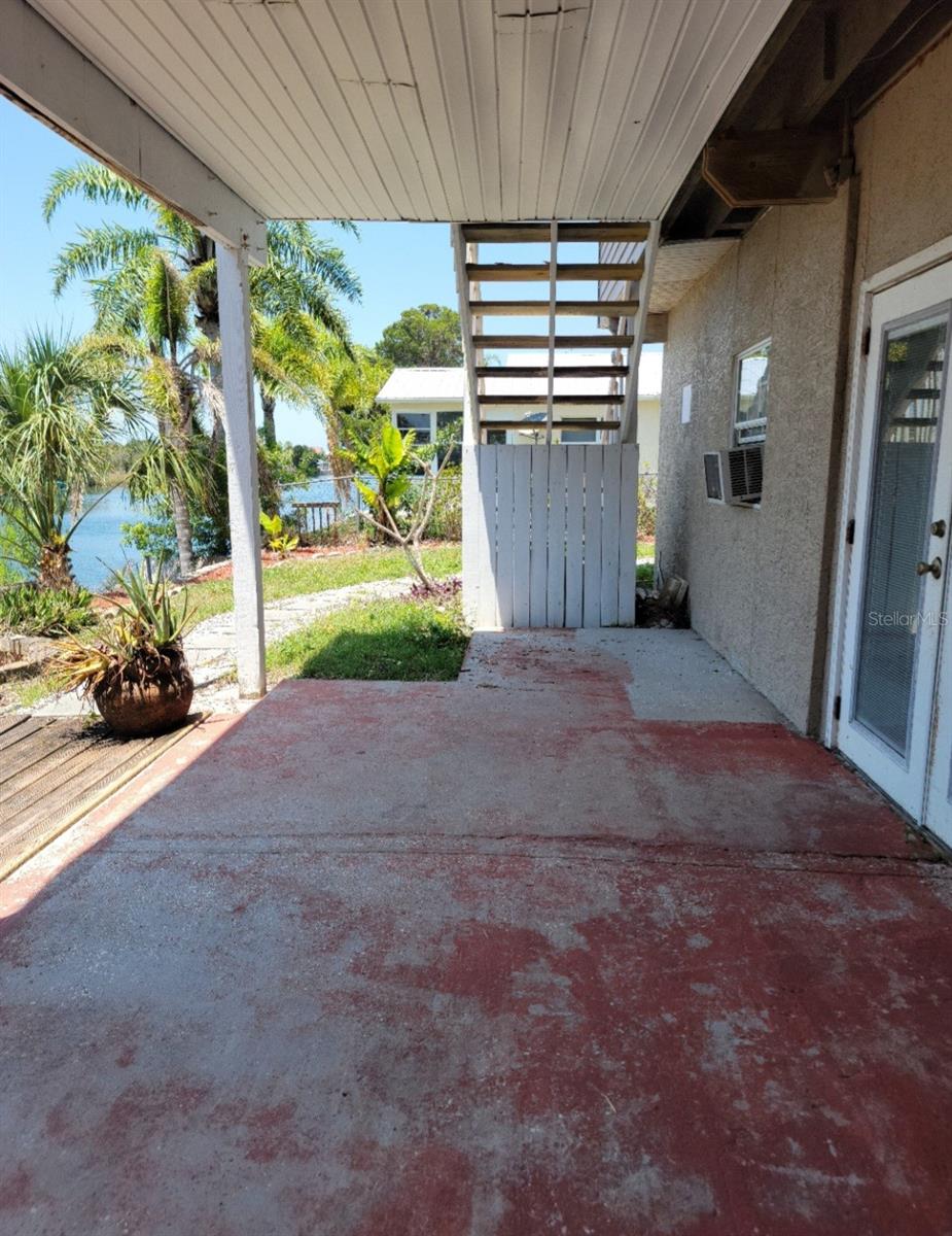 Brick porch in the front bottom area.