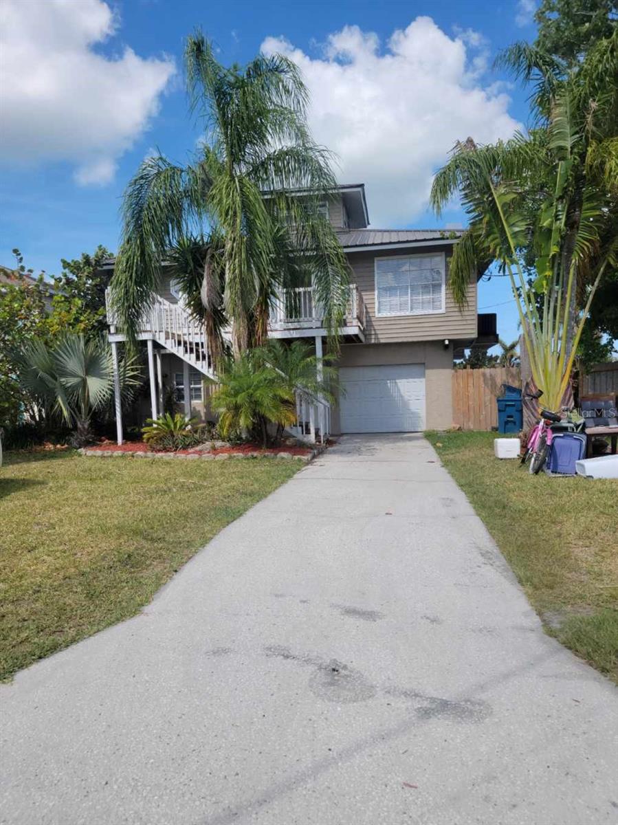 Long Driveway. Can park 3 cars.