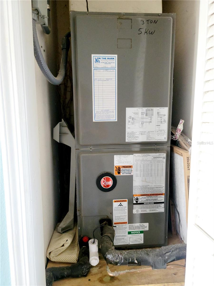 AC unit located near the laundry closet. Rheem AC replaced in 2016