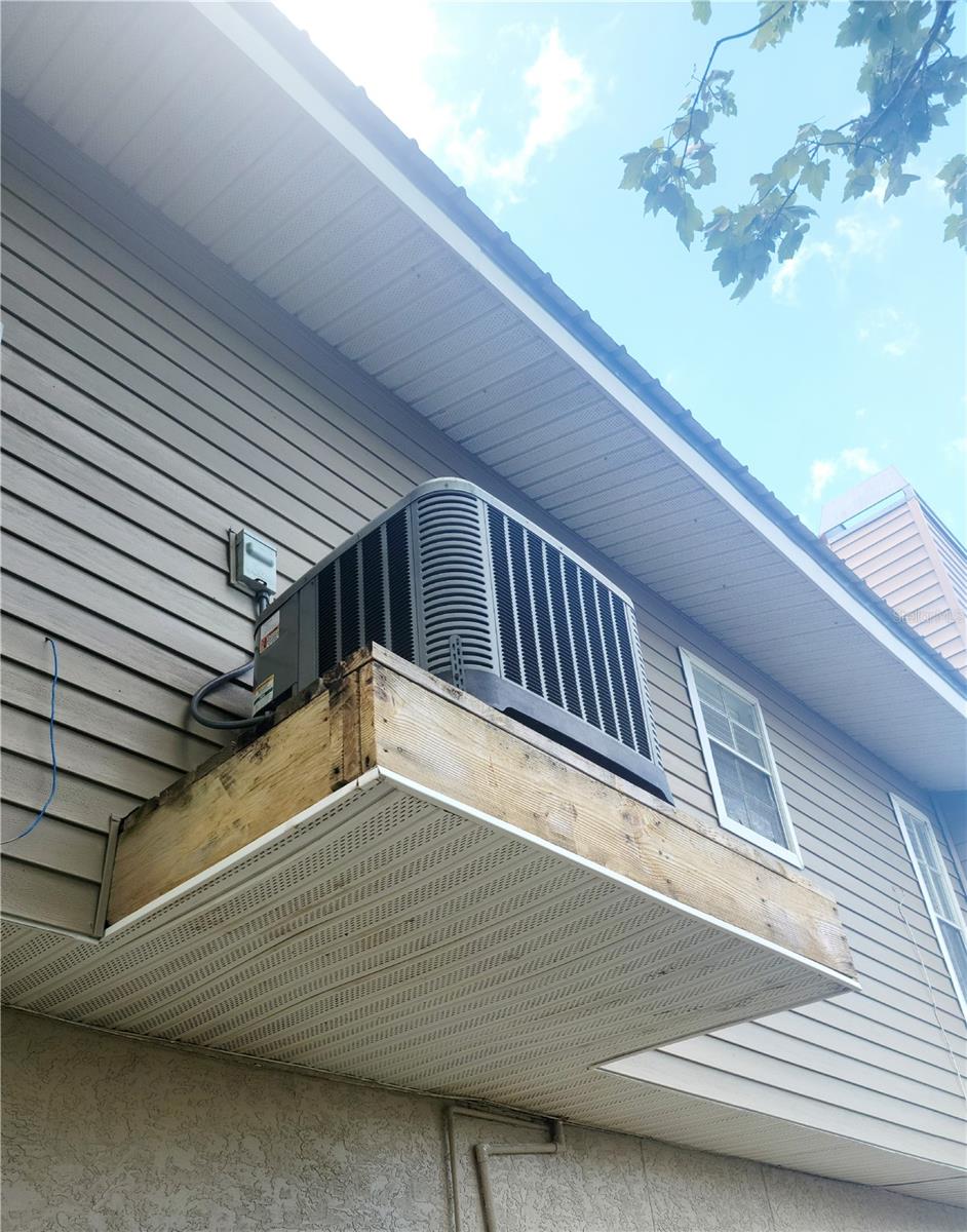 AC unit is lifted to the second level, Rheem 2016