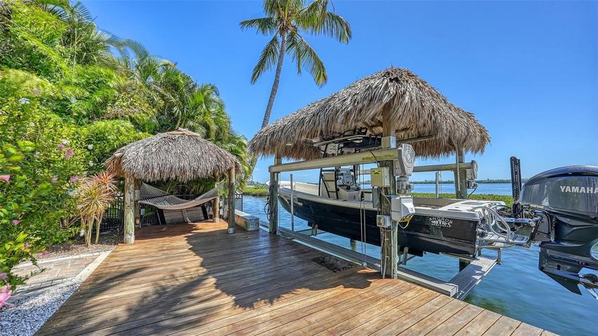 Custom palapas to relax in a hammock or fishing off the dock