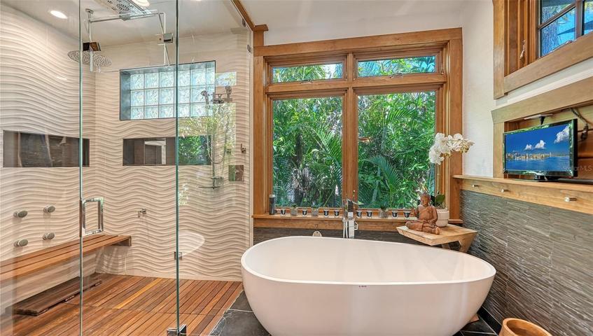 Steam shower & soaking tub with a ship inspired dual vanities