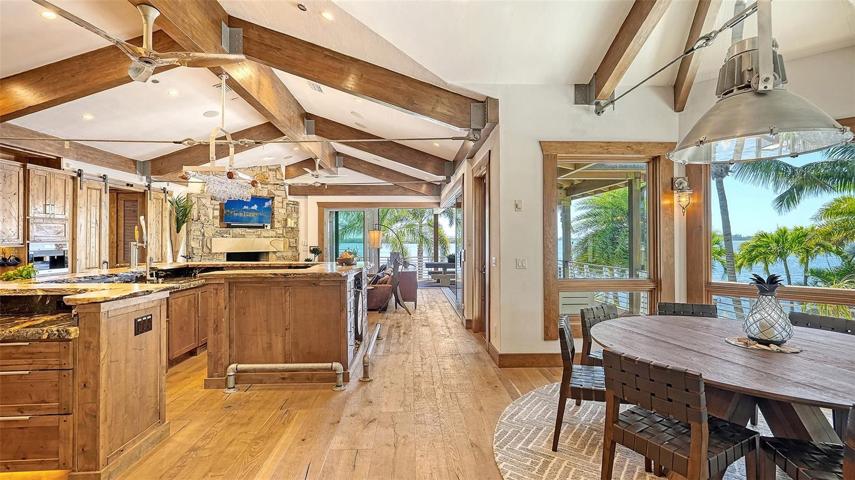 View of dining area, breakfast bar and great room - architectural elements abound!