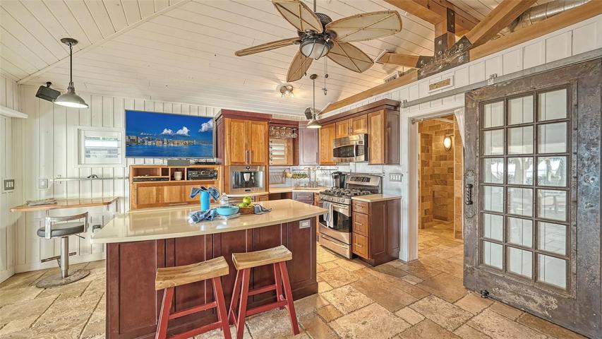 The "pool house" great room/kitchen with a desk area for writing