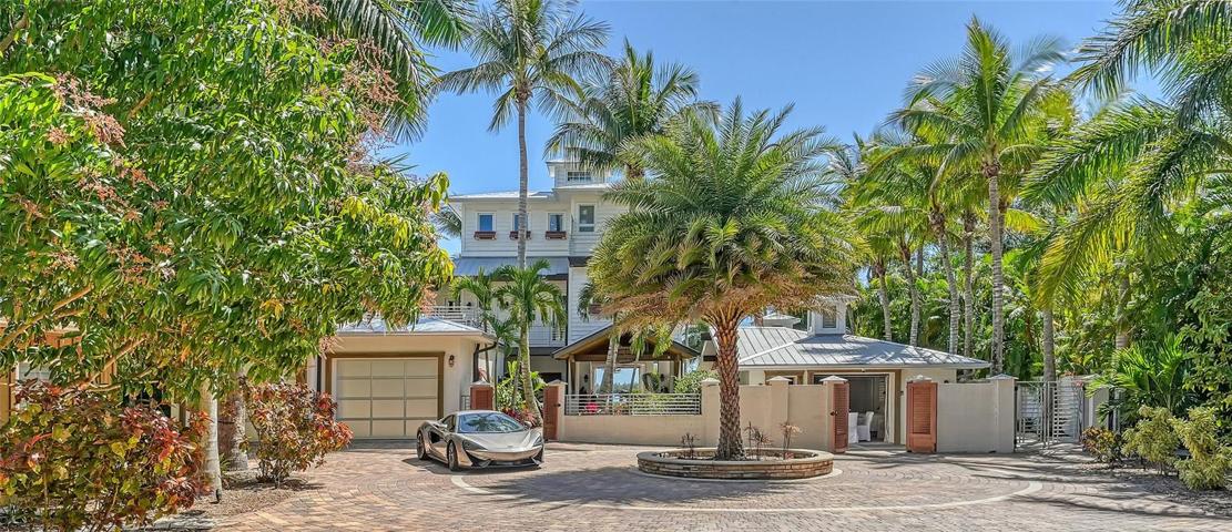 The entire estate is completely ensconsed in mature trees, bushes, and secure gates creating such island privacy !