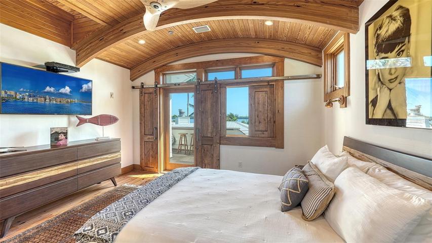 The custom tongue & groove ceiling captures the inspiration from a Yacht !