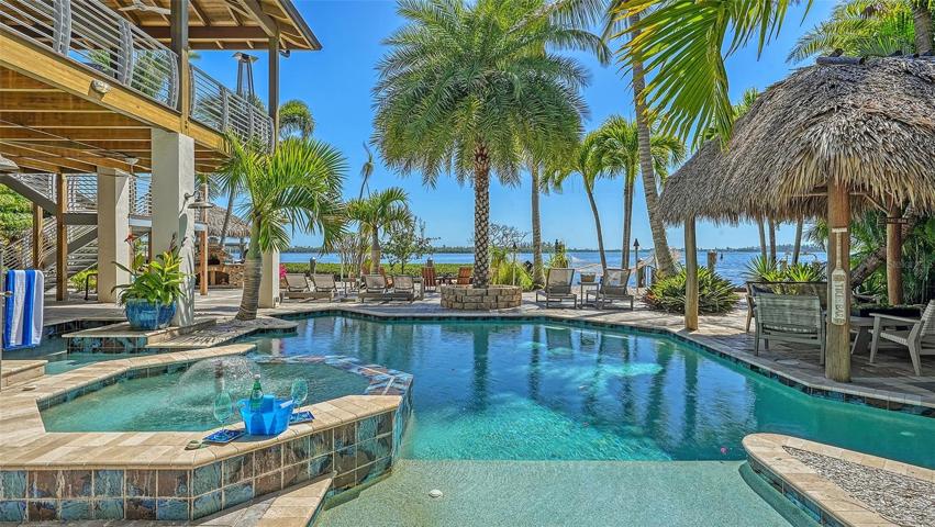 Relax everyday in the resort pool, spa, waterfront lounges and cabanas to enjoy the fish jumping