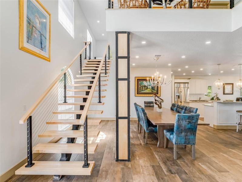 Amazing floating staircase leading upstairs