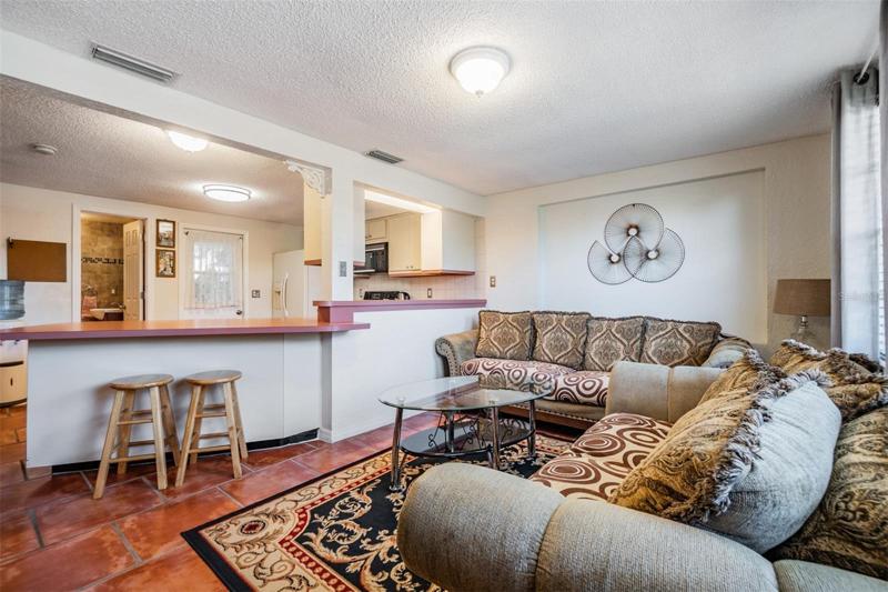 Family Room open to the kitchen, tile flooring