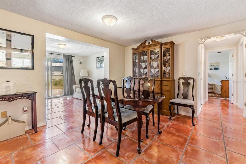 Dining room and flex space to the left side.   this space can be used as another den/office.
