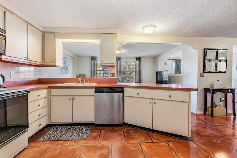 Large kitchen and open to the family room, tile flooring