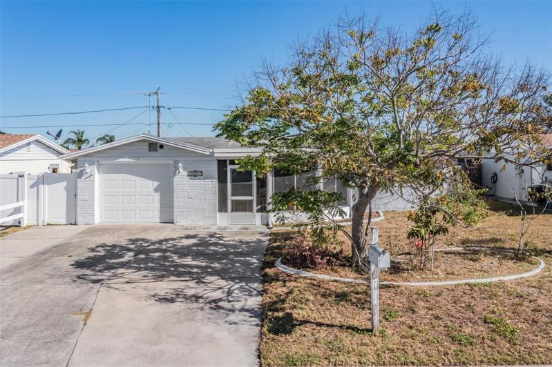 2 Bedroom, 2 bathroom, one car garage and large covered and screened front porch.