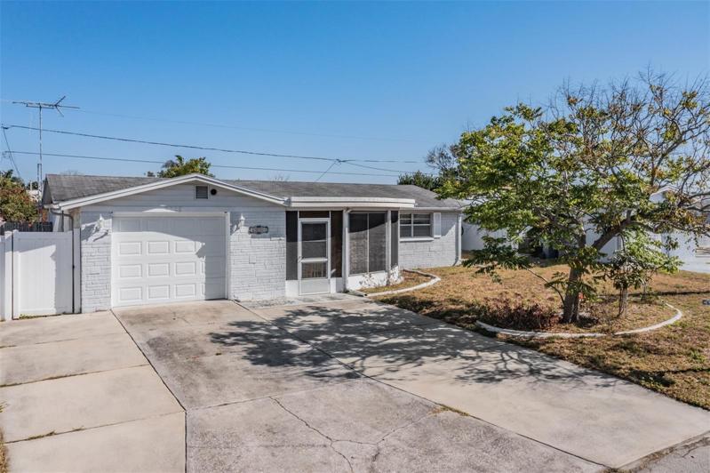 2 Bedroom, 2 bathroom, one car garage and large covered and screened front porch.