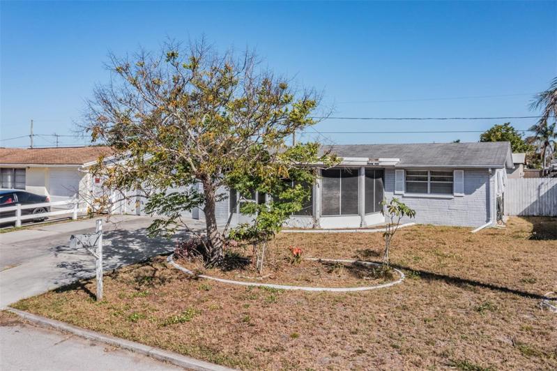 2 Bedroom, 2 bathroom, one car garage and large covered and screened front porch.