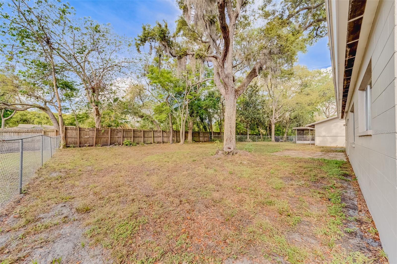 HUGE, FULLY FENCED backyard
